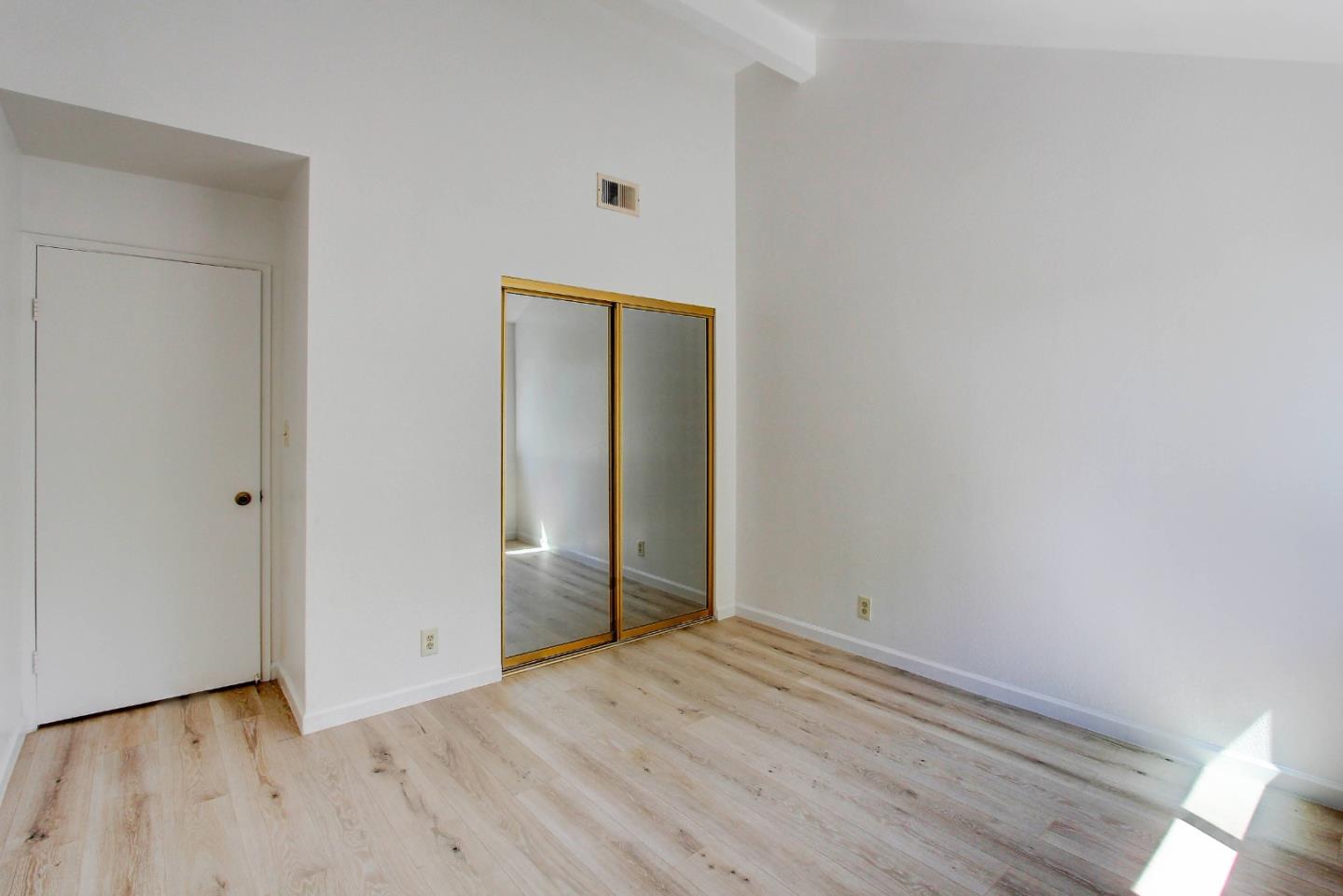 258 Paseo Bernal Moraga, CA 94556 - Photo 19 of 43 a view of an empty room with wooden floor