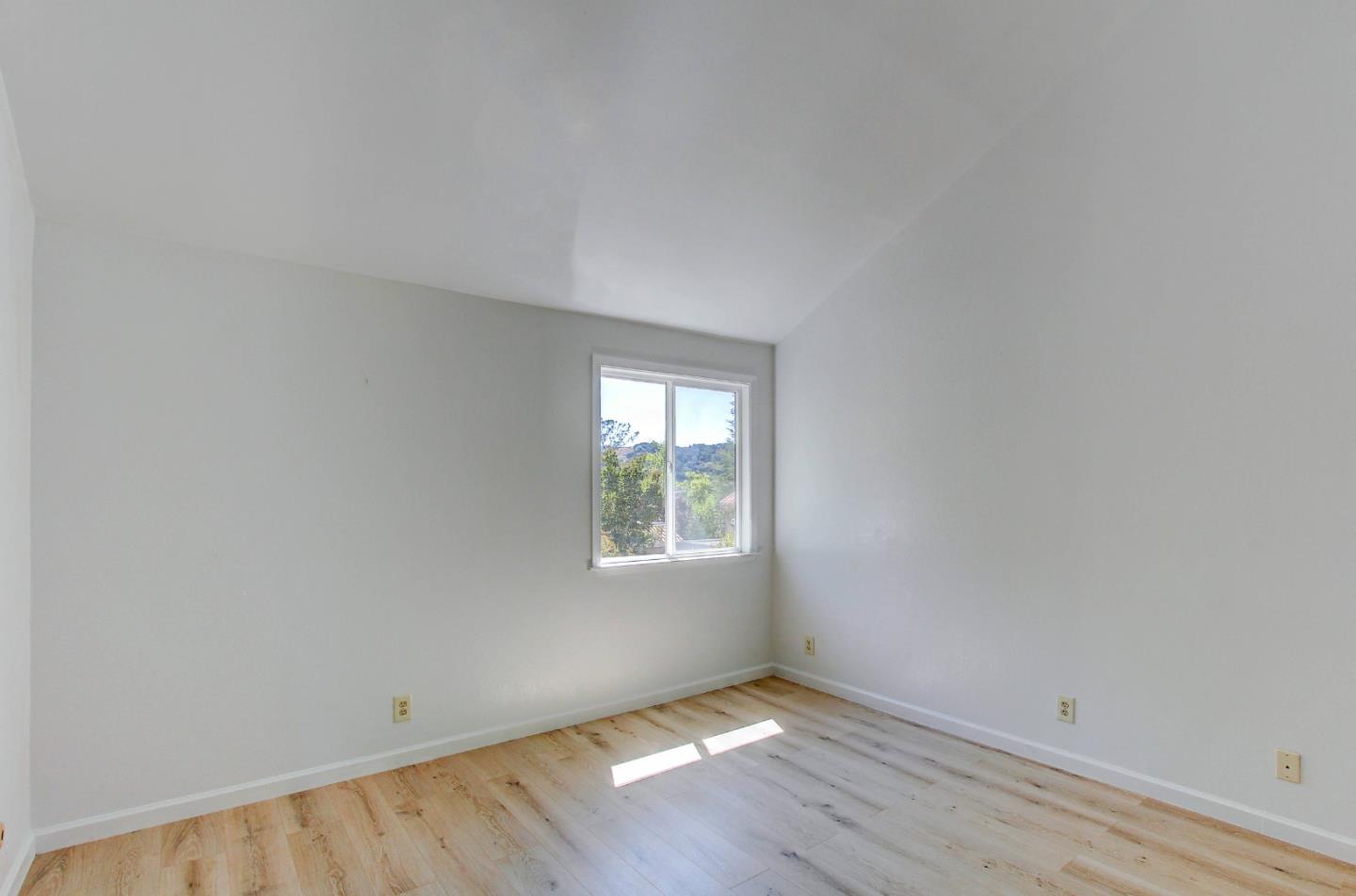 258 Paseo Bernal Moraga, CA 94556 - Photo 21 of 43 an empty room with wooden floor and windows