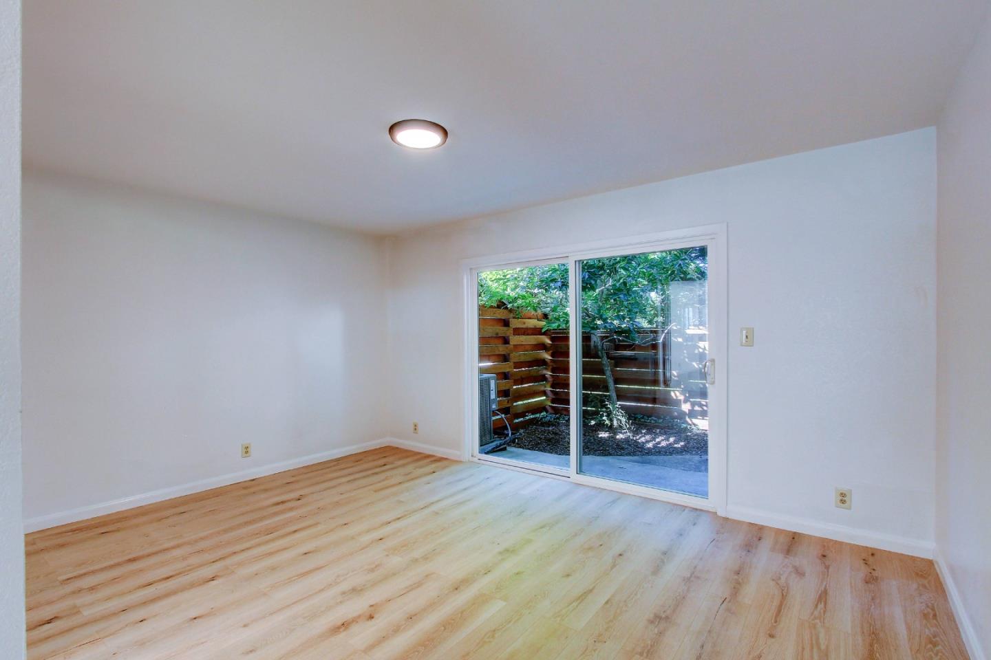 258 Paseo Bernal Moraga, CA 94556 - Photo 24 of 43 wooden floor in an empty room with a window