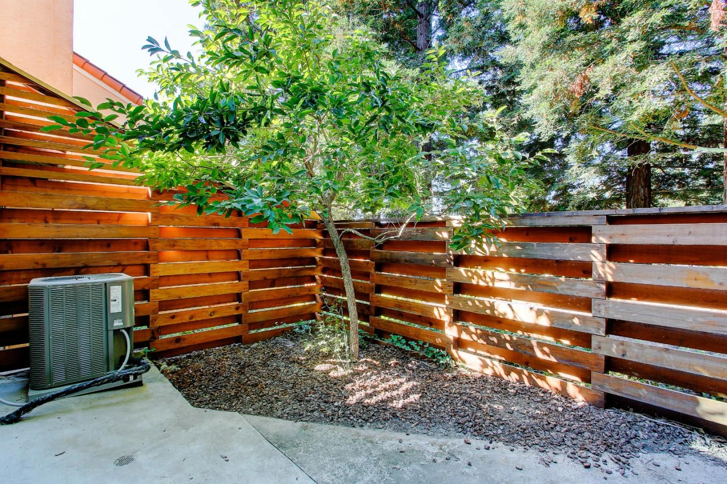 258 Paseo Bernal Moraga, CA 94556 - Photo 27 of 43 a view of a wooden bench next to a yard