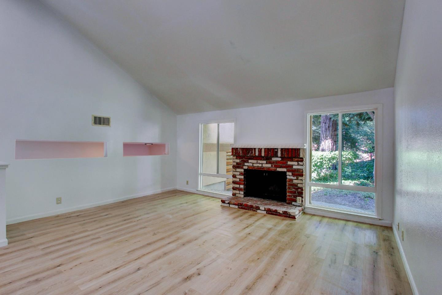 258 Paseo Bernal Moraga, CA 94556 - Photo 7 of 43 a living room with furniture and a fireplace