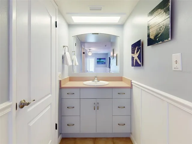 a bathroom with a shower and a toilet