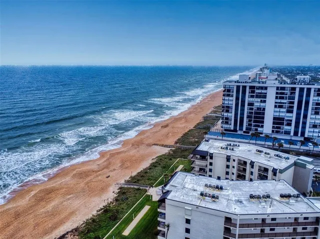 a view of a terrace with a yard