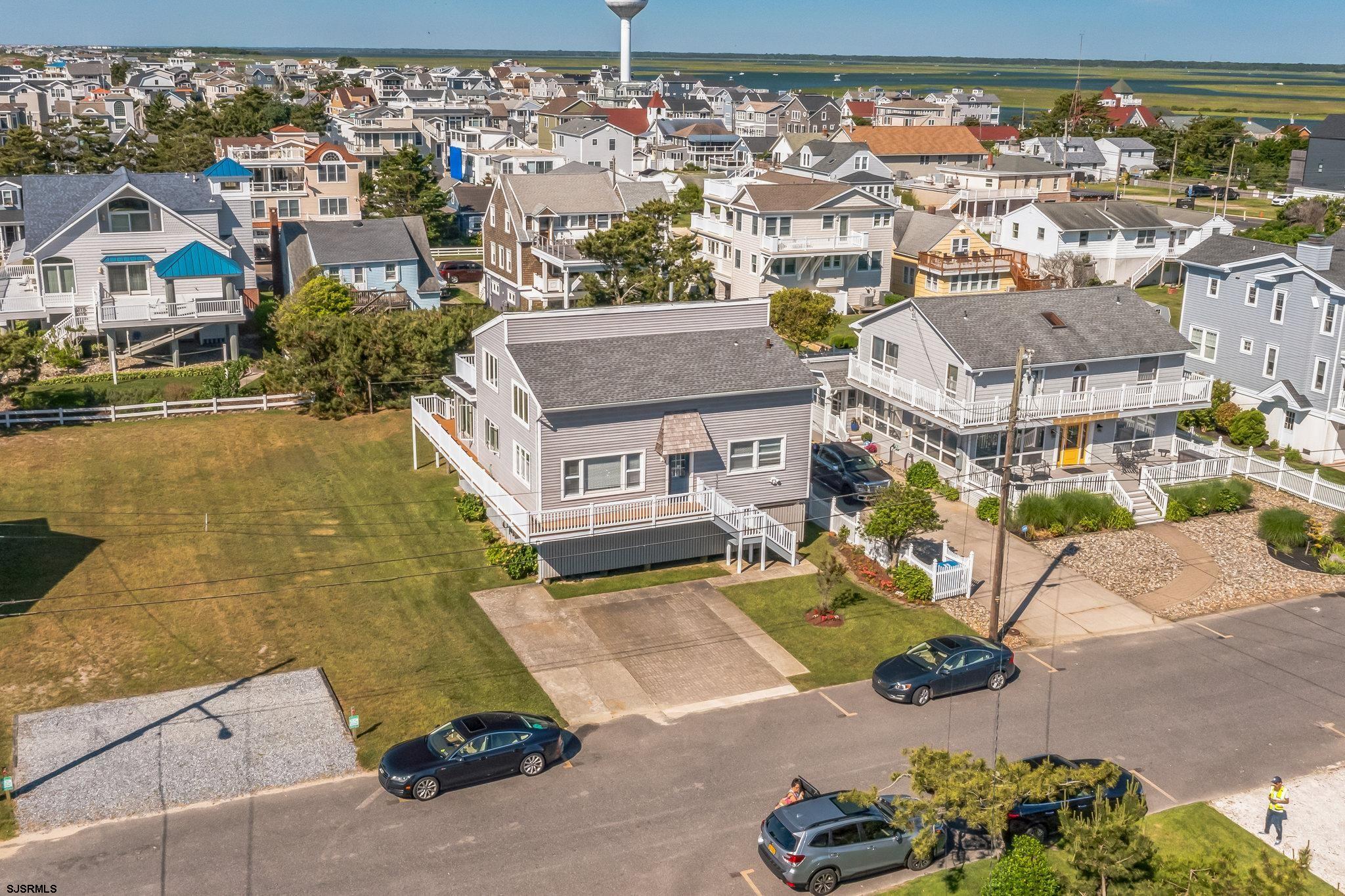 22 Williams Avenue Strathmere, NJ 08248 - Photo 25 of 40 an aerial view of a house with a swimming pool