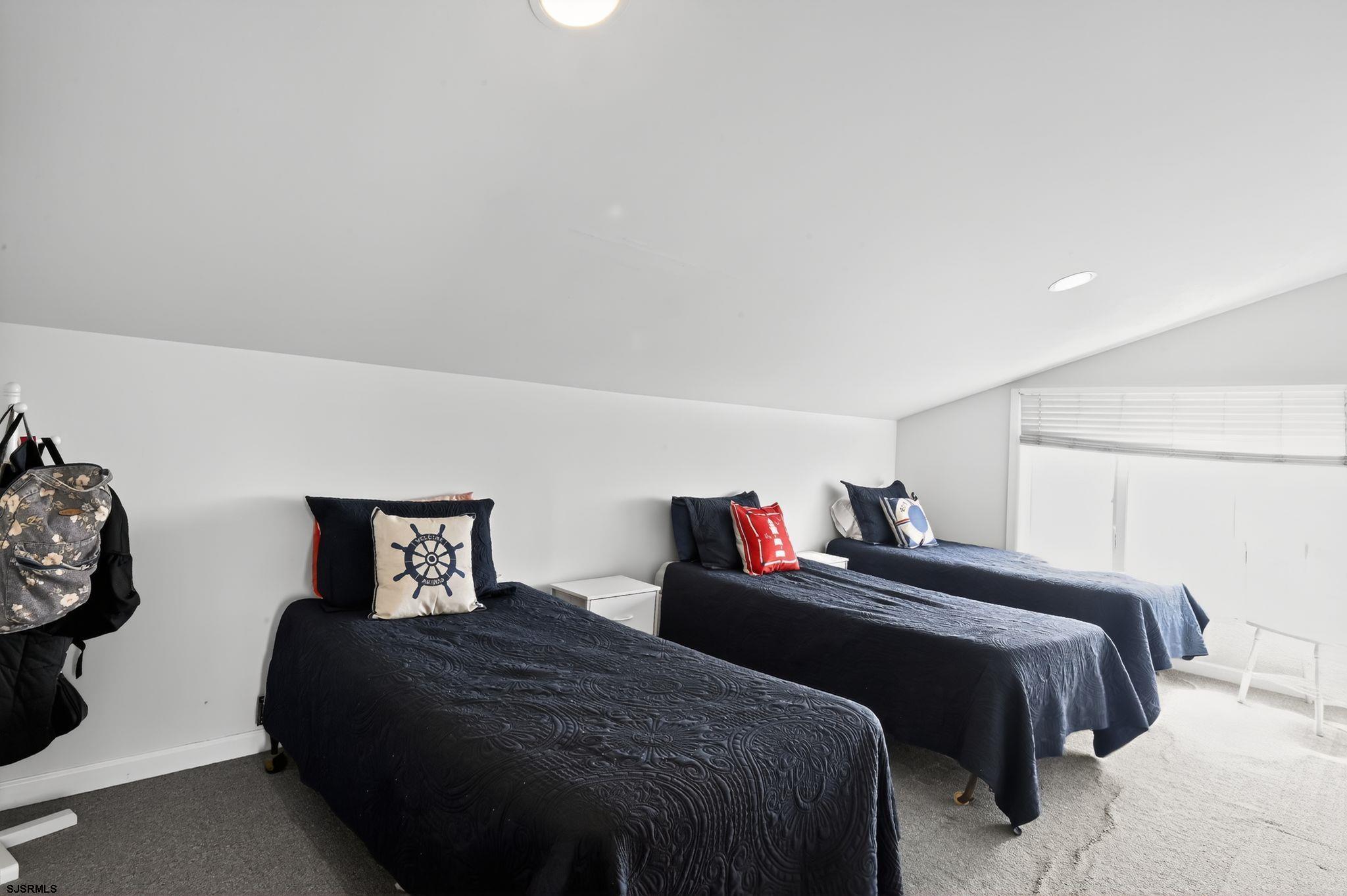 22 Williams Avenue Strathmere, NJ 08248 - Photo 25 of 40 a bedroom with a bed and closet