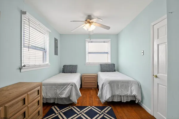 an aerial view of a house with a swimming pool