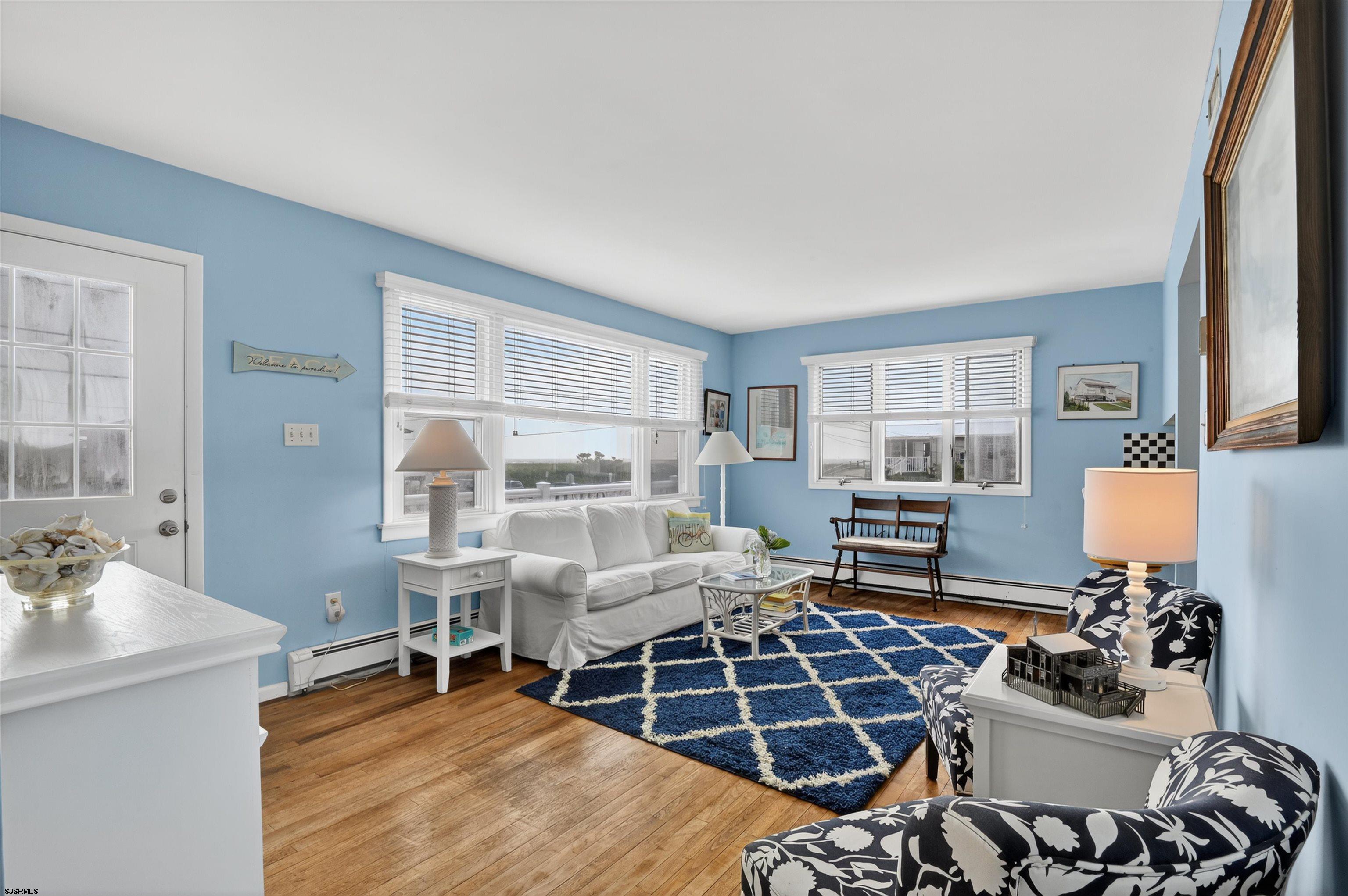 22 Williams Avenue Strathmere, NJ 08248 - Photo 8 of 40 a living room with furniture a rug and a window