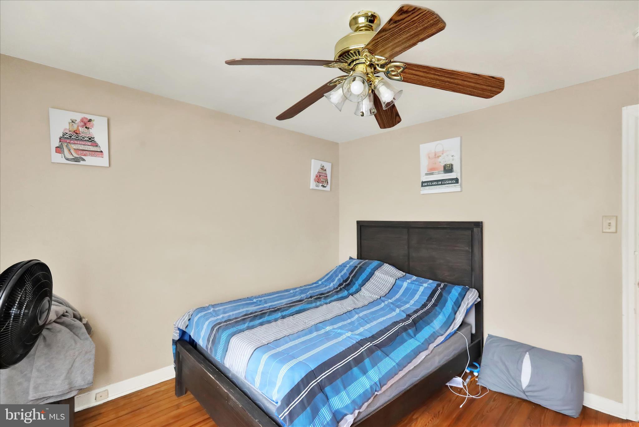 655 South Ann Street Lancaster, PA 17602 - Photo 12 of 18 a bedroom with bed and wooden floor