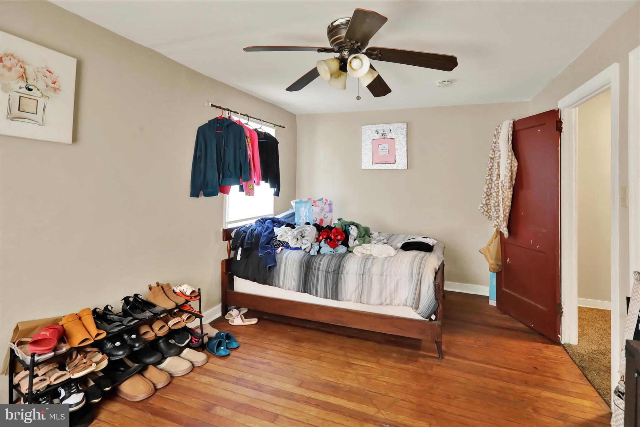 655 South Ann Street Lancaster, PA 17602 - Photo 9 of 18 a bedroom with furniture and wooden floor