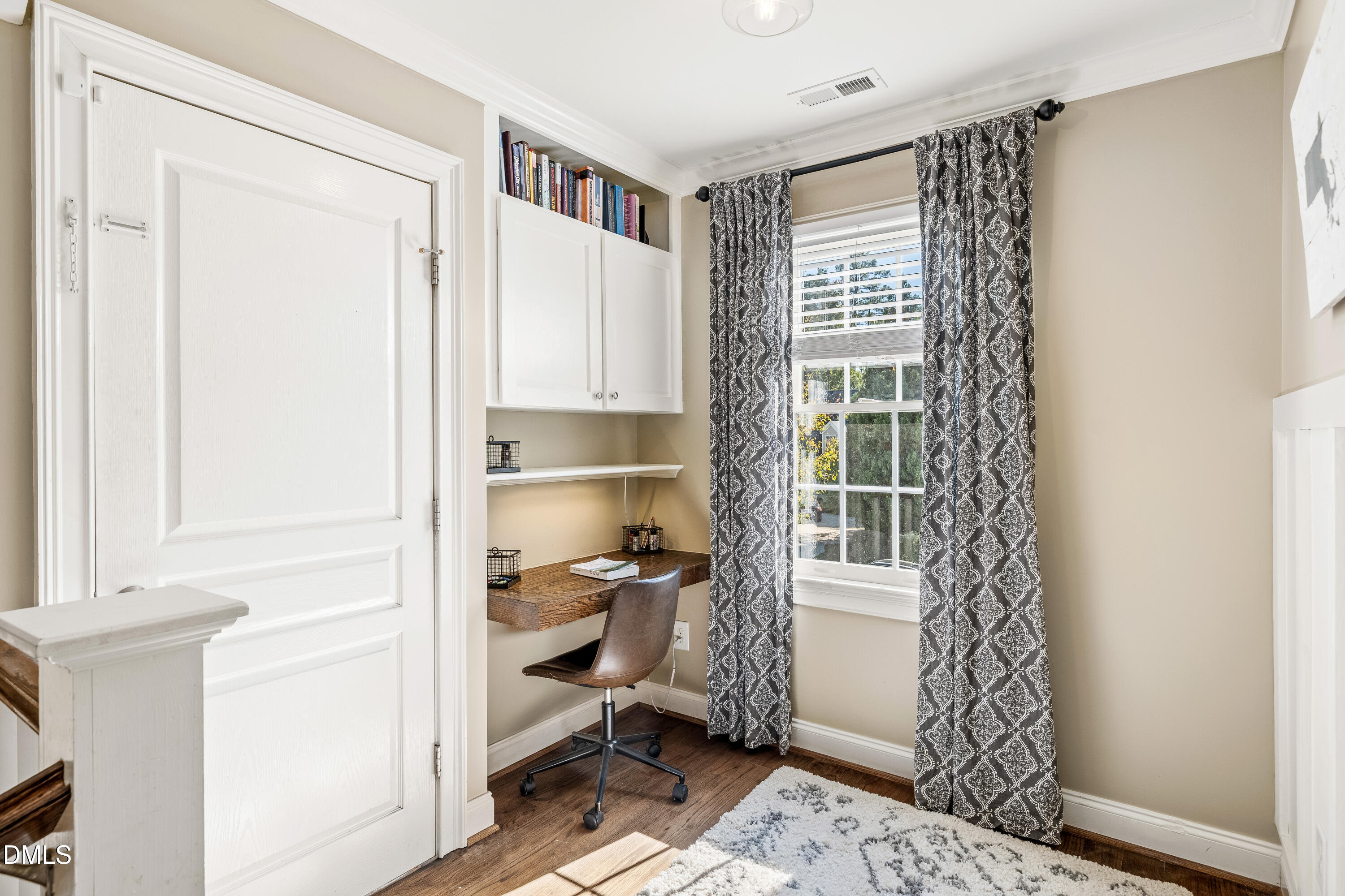 501 Wescott Ridge Drive Holly Springs, NC 27540 - Photo 25 of 52 a view of a hallway with closet and a window