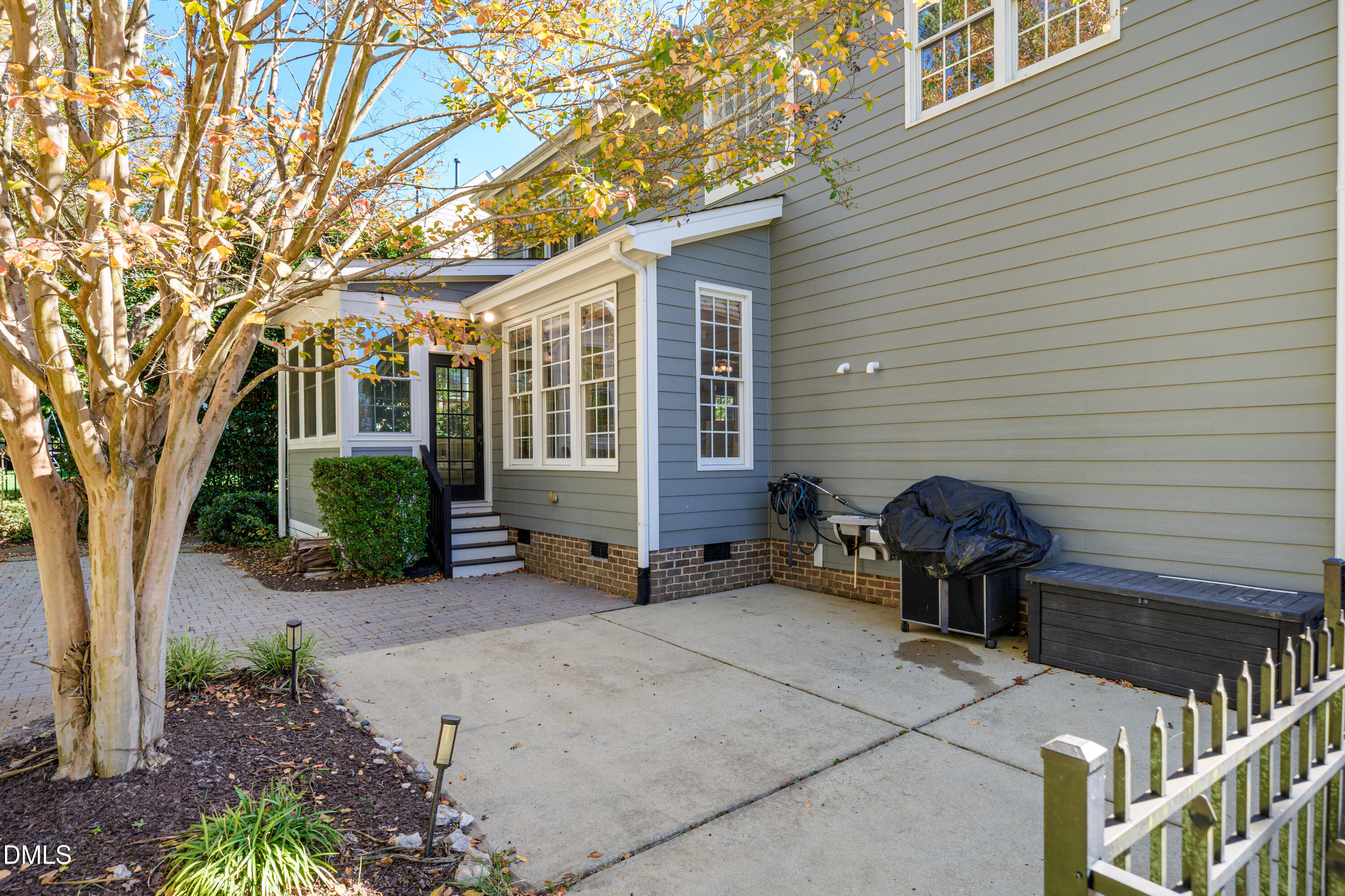 501 Wescott Ridge Drive Holly Springs, NC 27540 - Photo 37 of 52 a view of a house with backyard and sitting area
