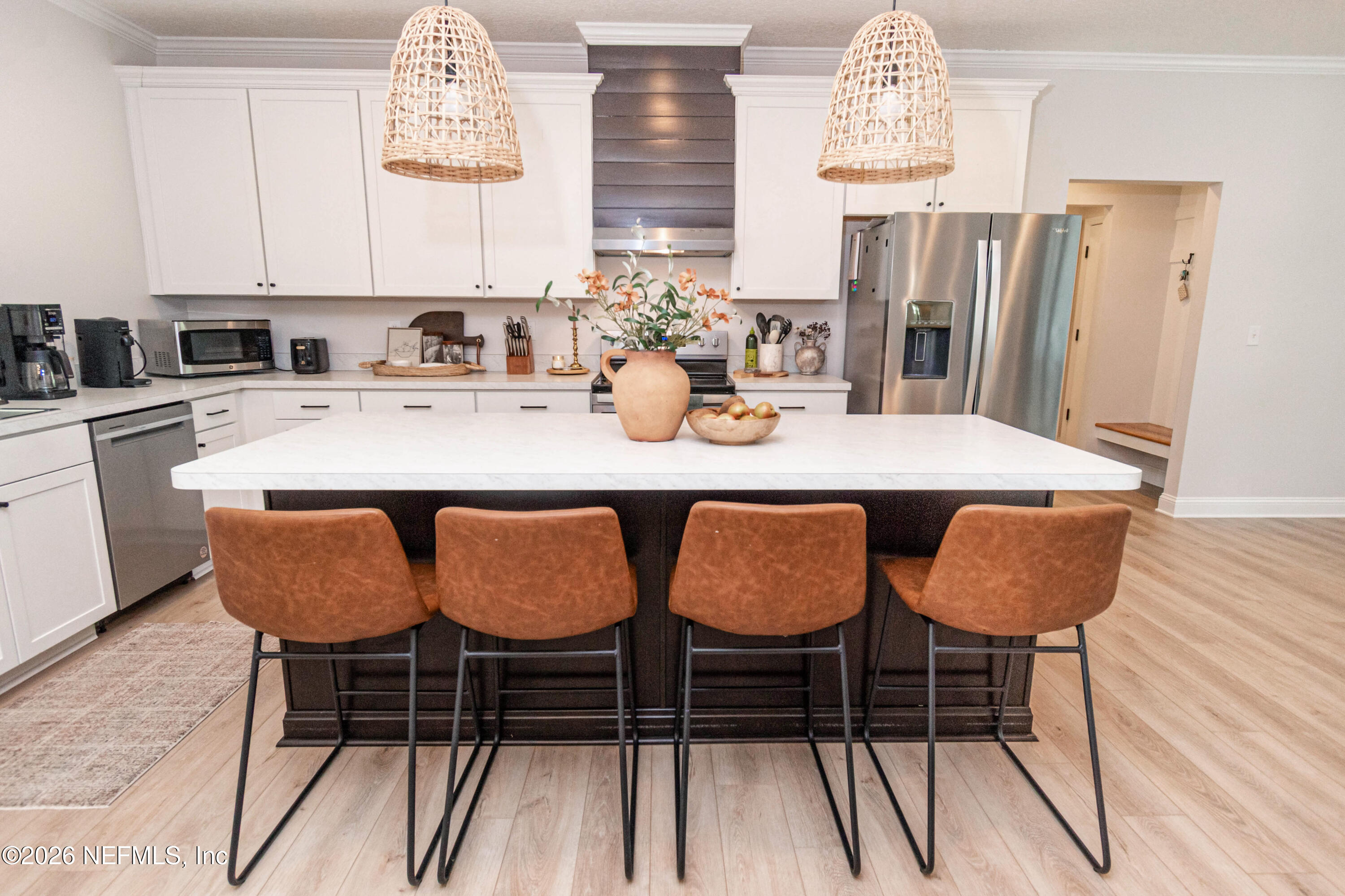10800 Plummer Road Jacksonville, FL 32219 - Photo 11 of 67 a view of a dining room with furniture and wooden floor