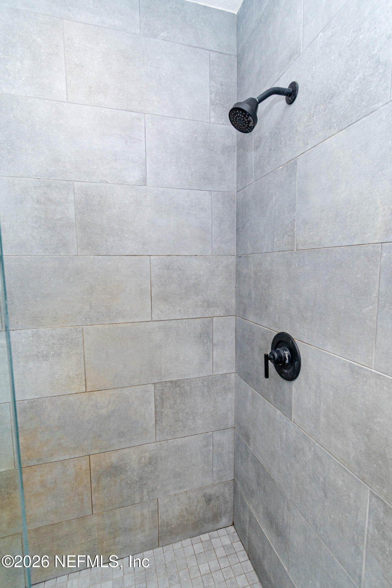 10800 Plummer Road Jacksonville, FL 32219 - Photo 29 of 67 a bathroom with a shower