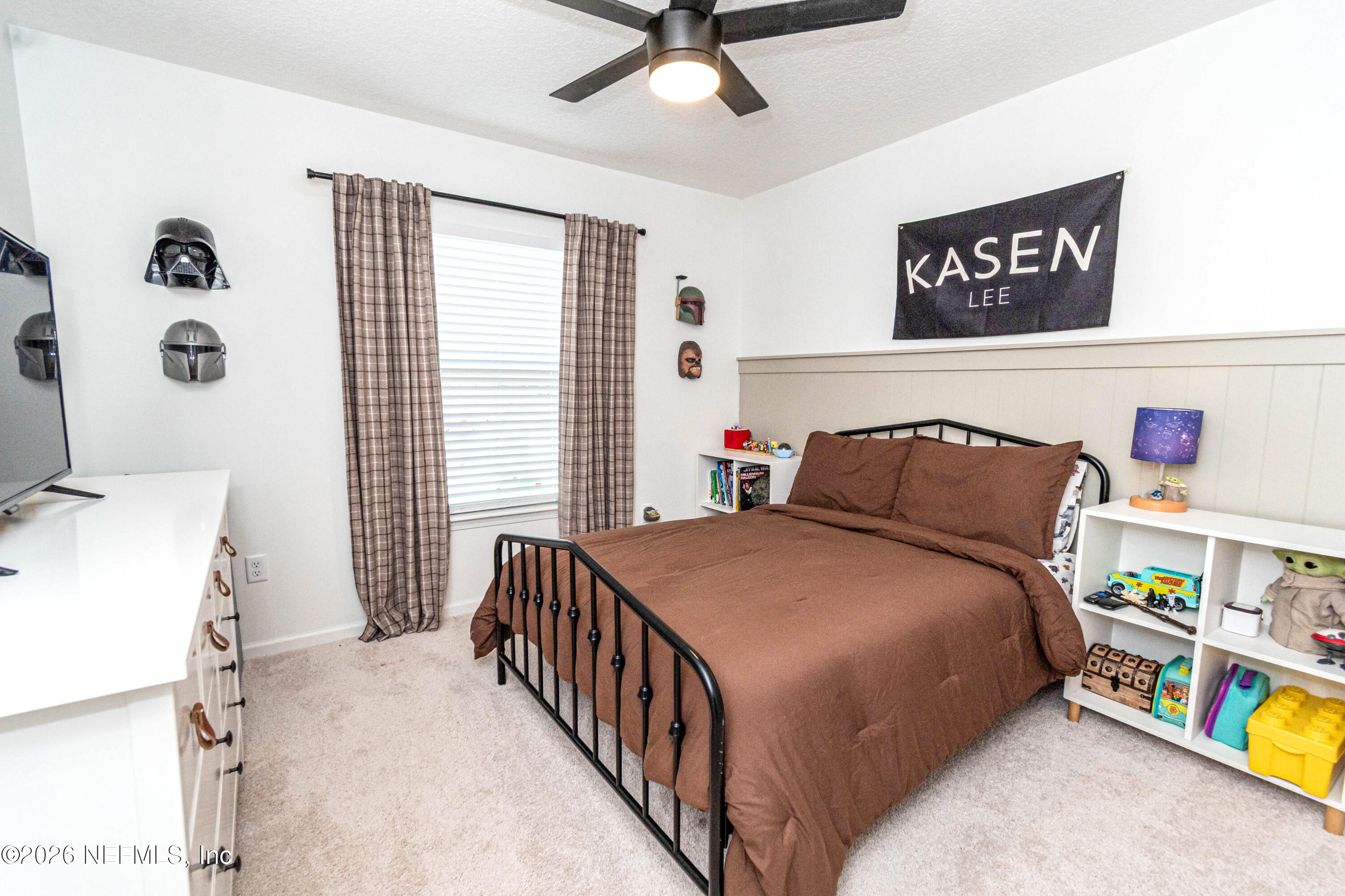 10800 Plummer Road Jacksonville, FL 32219 - Photo 35 of 67 a bedroom with a bed and a window