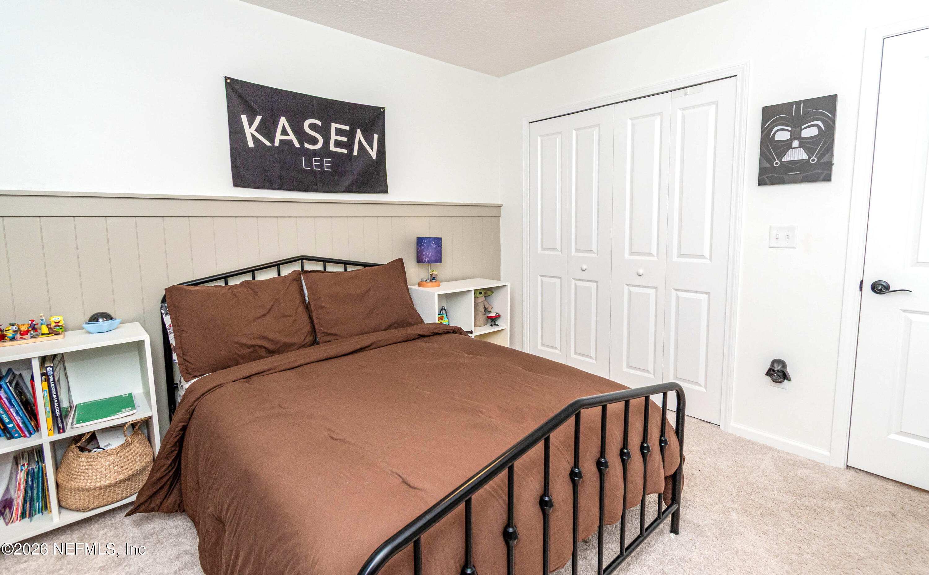 10800 Plummer Road Jacksonville, FL 32219 - Photo 37 of 67 a bedroom with a bed and a window