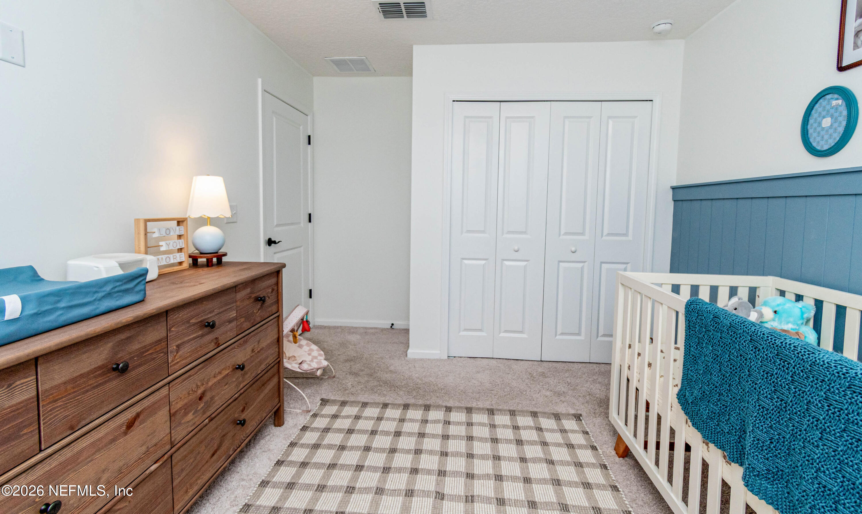10800 Plummer Road Jacksonville, FL 32219 - Photo 40 of 67 a bathroom with a sink a toilet and a mirror