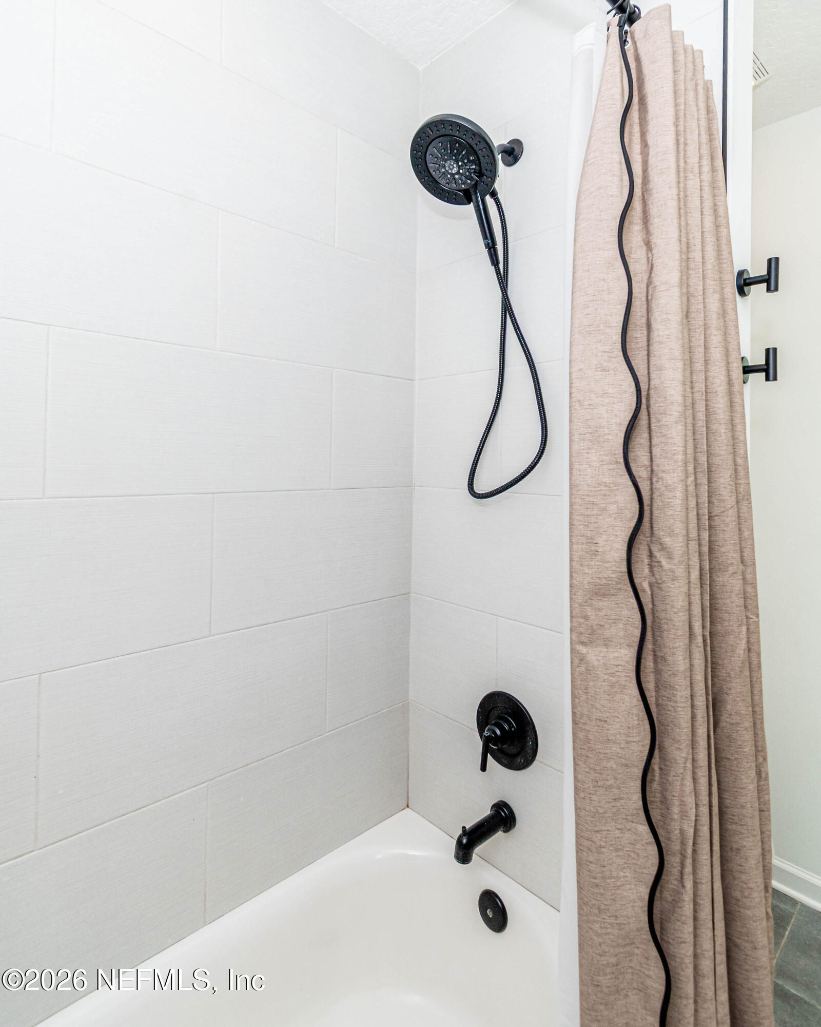 10800 Plummer Road Jacksonville, FL 32219 - Photo 44 of 67 a bathroom with a shower