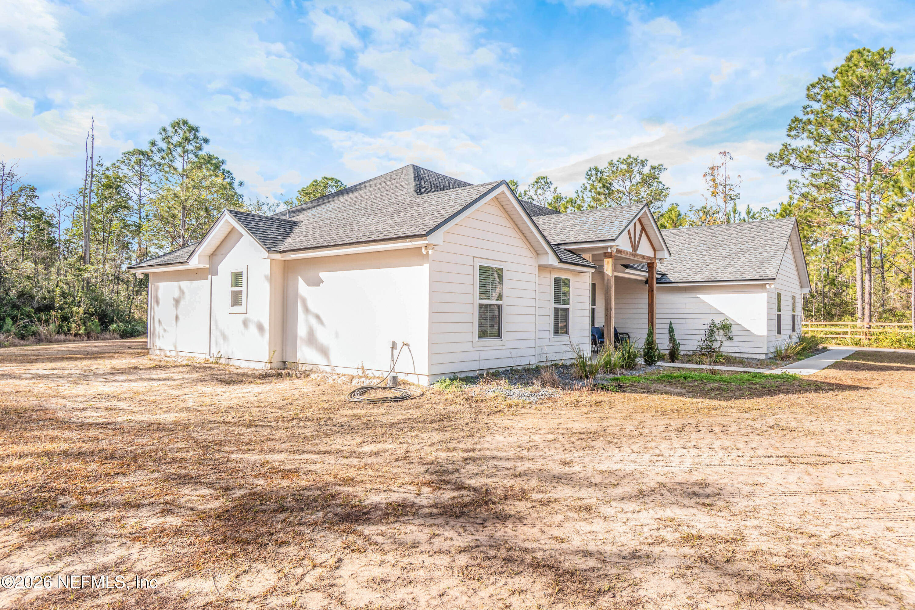 10800 Plummer Road Jacksonville, FL 32219 - Photo 56 of 67 a view of a house with a yard