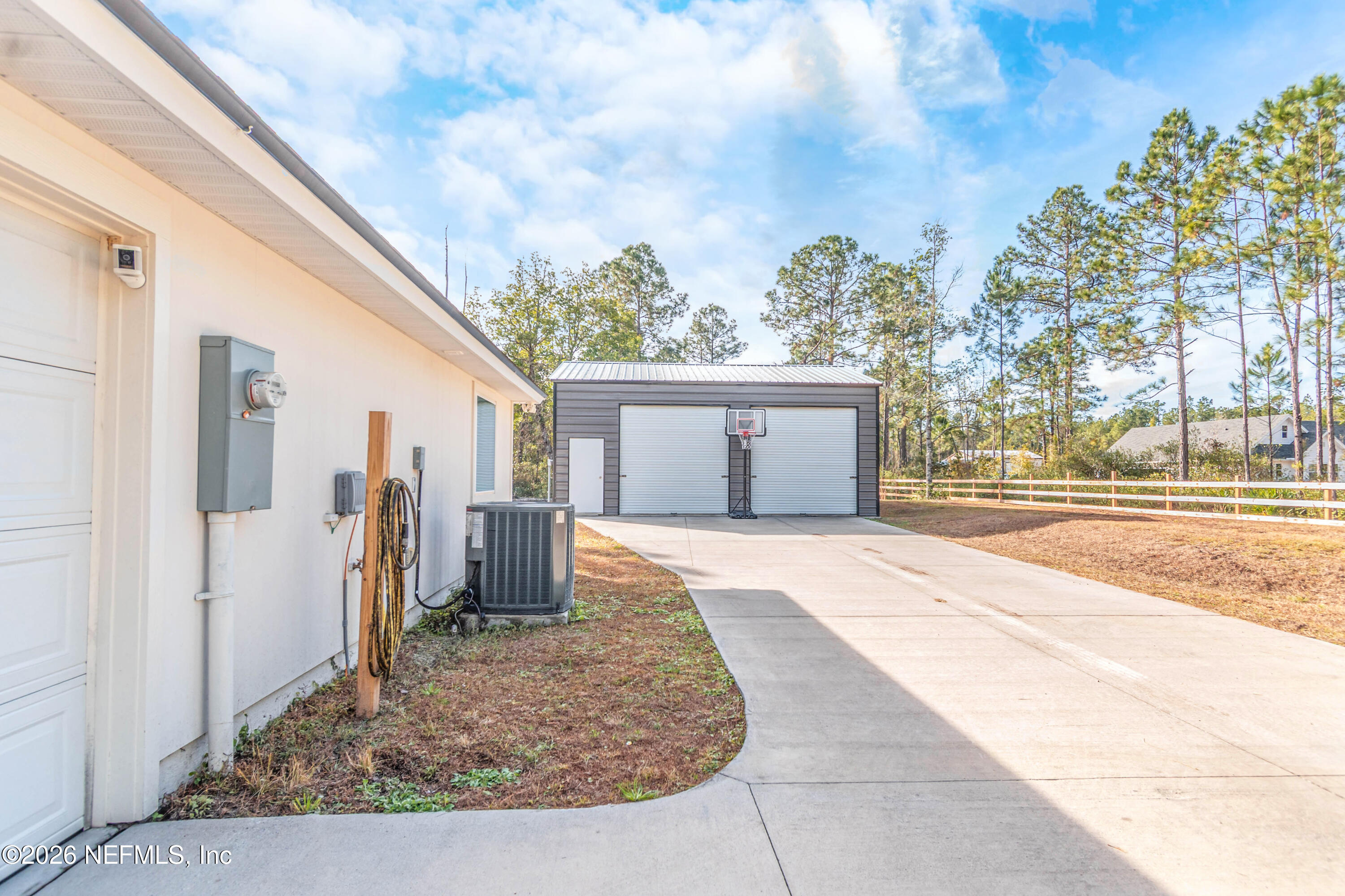 10800 Plummer Road Jacksonville, FL 32219 - Photo 57 of 67 a view of a house with a yard