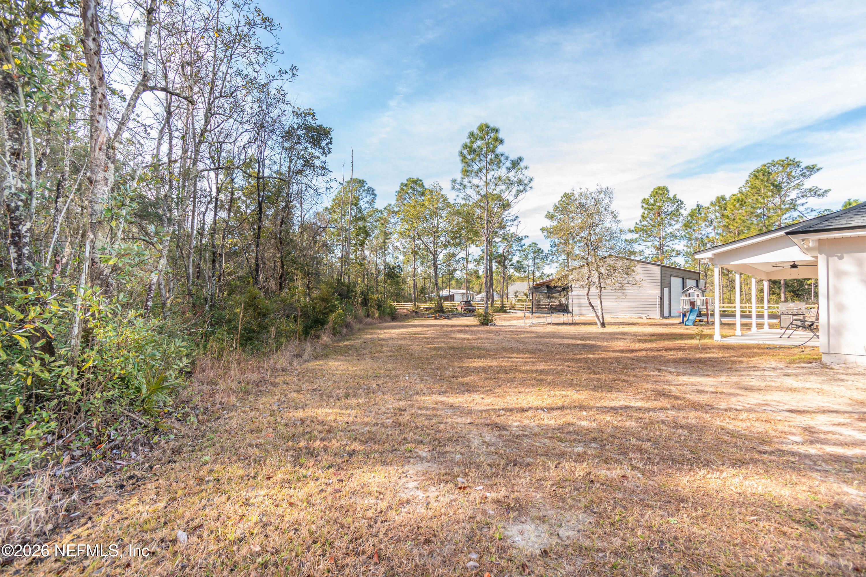 10800 Plummer Road Jacksonville, FL 32219 - Photo 63 of 67 a view of road with large trees