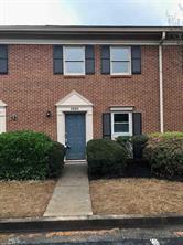 2880 Webb Bridge Road Alpharetta, GA 30009 - Photo 1 of 1 a front view of a house with a yard