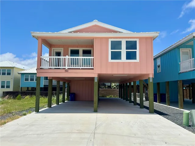 a view of a building with a garden