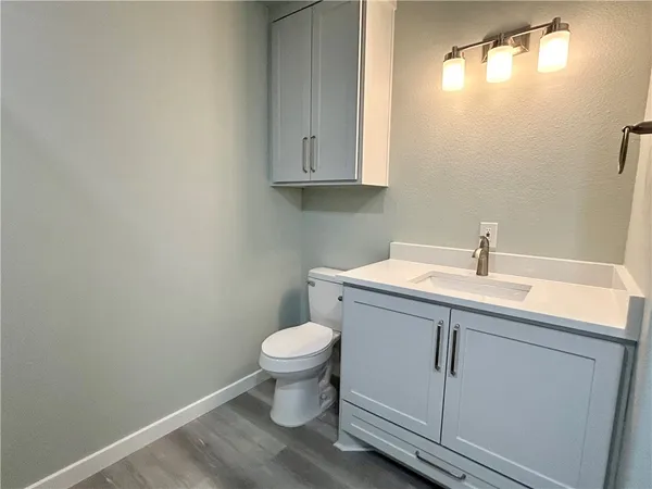 a bathroom with a sink and a toilet