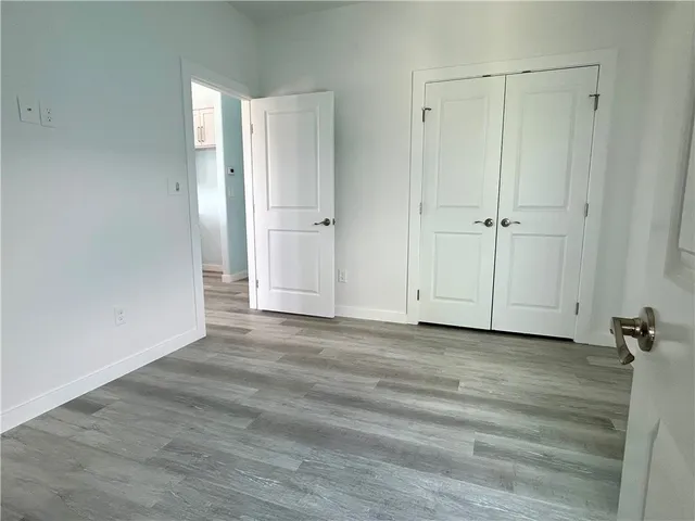 a view of a closet area with empty room