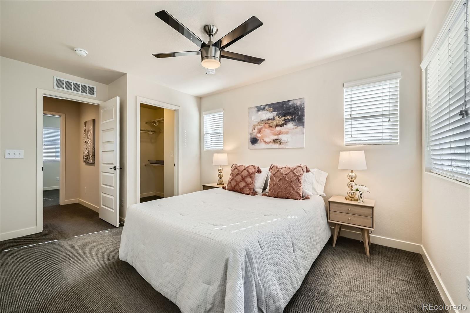 11225 Colony Circle Broomfield, CO 80021 - Photo 13 of 25 a bedroom with a bed and a window