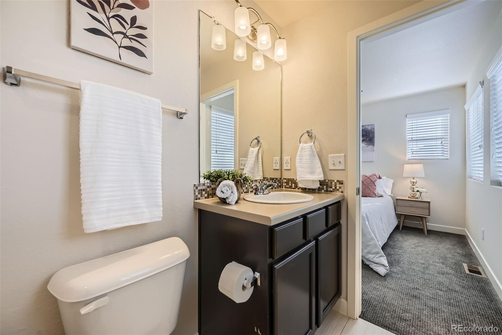 11225 Colony Circle Broomfield, CO 80021 - Photo 15 of 25 a view of bathroom with dual sinks