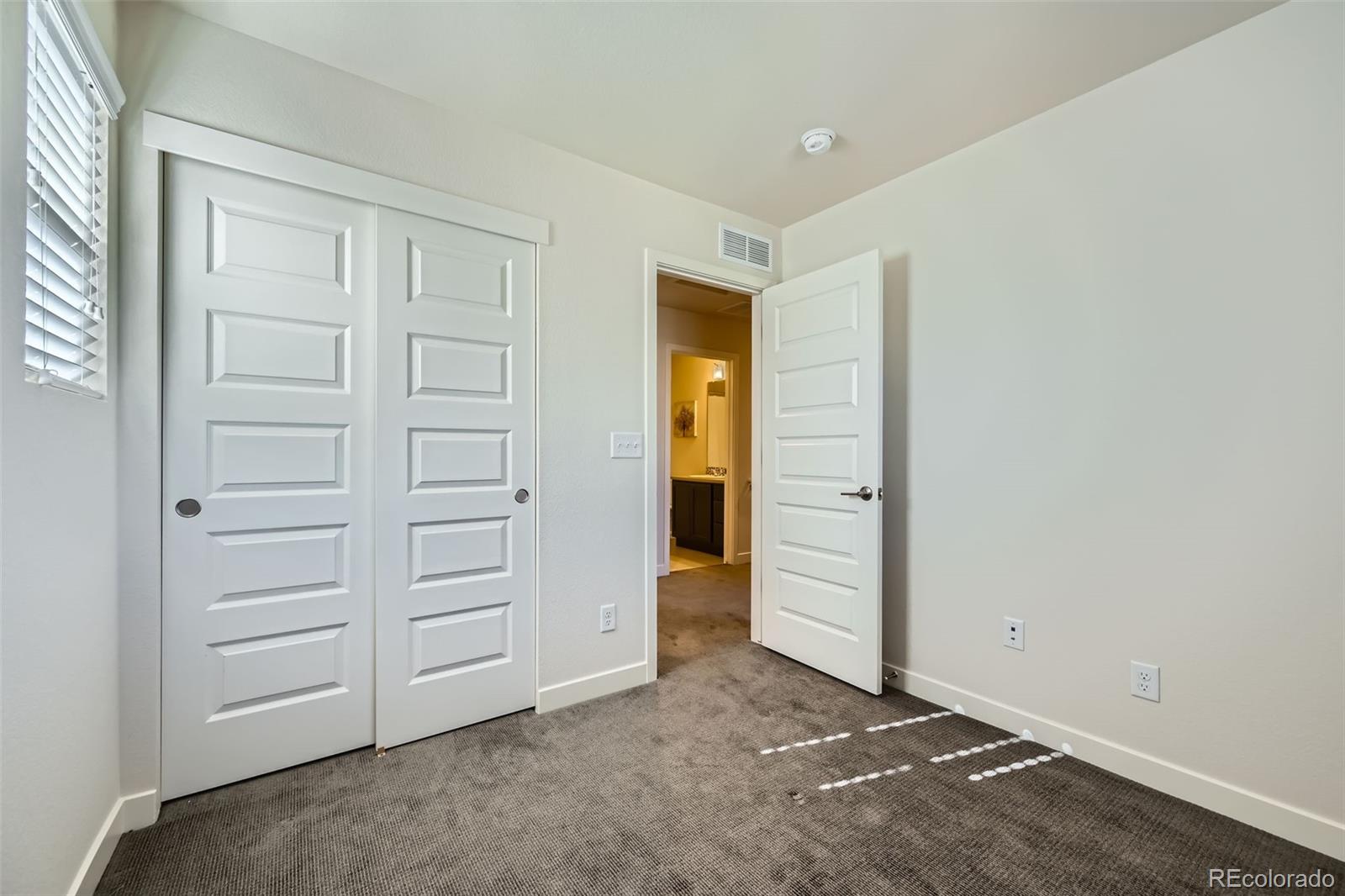 11225 Colony Circle Broomfield, CO 80021 - Photo 17 of 25 an empty room with closet