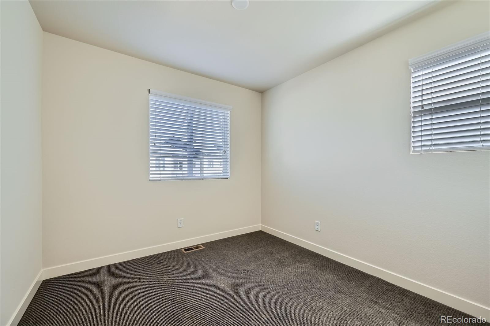 11225 Colony Circle Broomfield, CO 80021 - Photo 19 of 25 an empty room with a window
