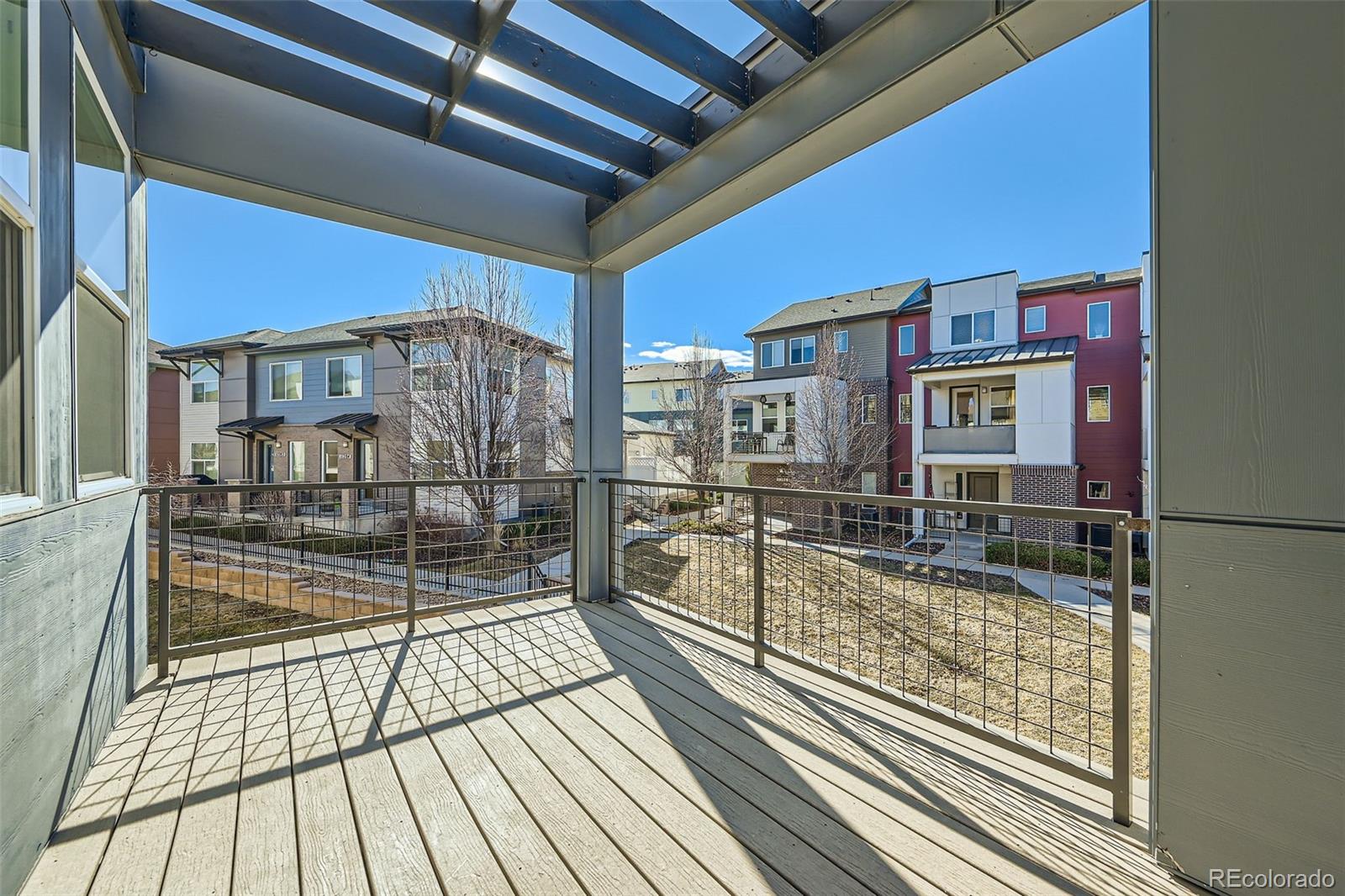 11225 Colony Circle Broomfield, CO 80021 - Photo 21 of 25 a view of a balcony with wooden floor