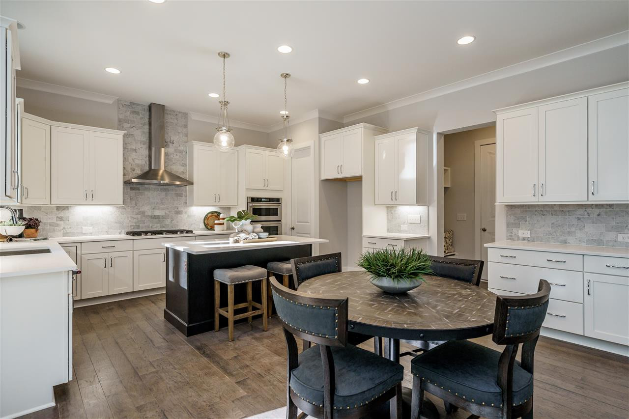 5708 Norcrest Street, Unit 3 Raleigh, NC 27612 - Photo 14 of 30 Quartz Countertops and Marble Backsplash