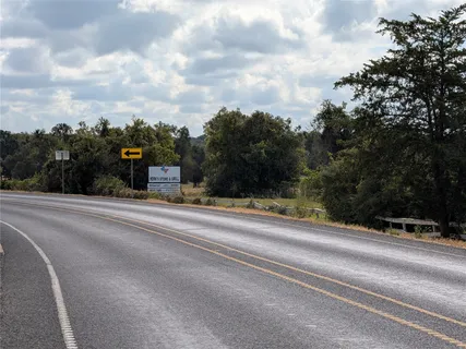a view of a lake with a big yard