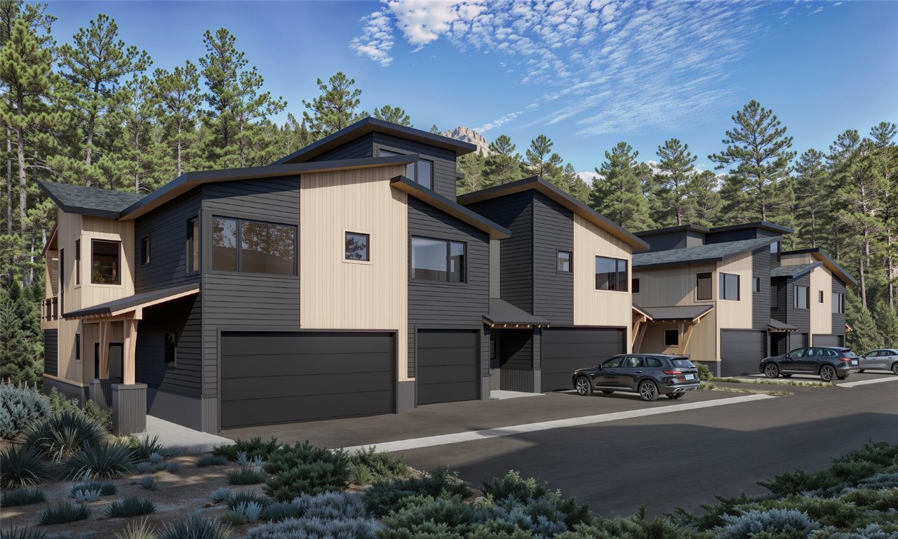 624 Montezuma Road, Unit B4 Keystone, CO 80435 - Photo 2 of 15 a front view of a house with a yard