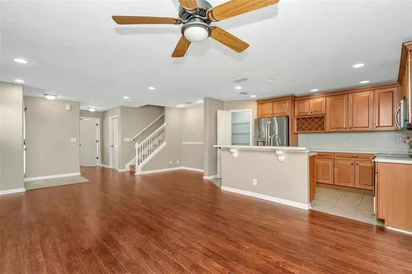 a view of a kitchen with a sink and a window