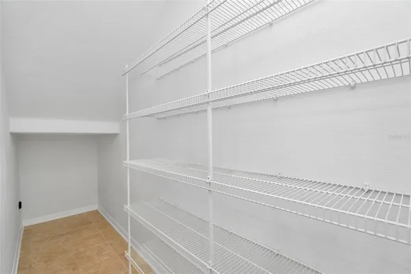 a view of a room with rack on the wall