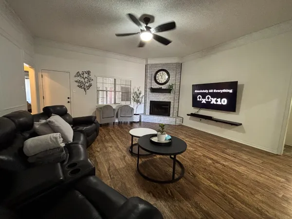 a living room with furniture and a table