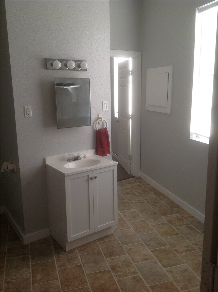 2580 5th Street Ingleside, TX 78362 - Photo 26 of 28 a room with washing machine