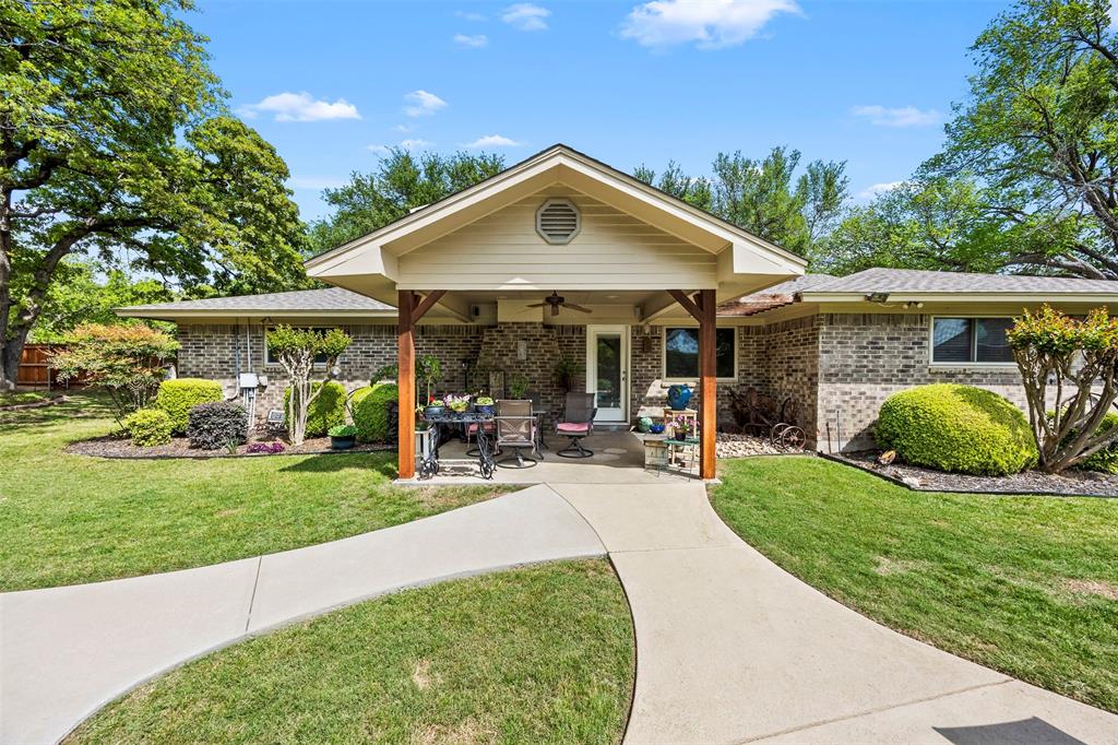 505 Curtis Road Burleson, TX 76028 - Photo 4 of 19 a view of a house with backyard and porch