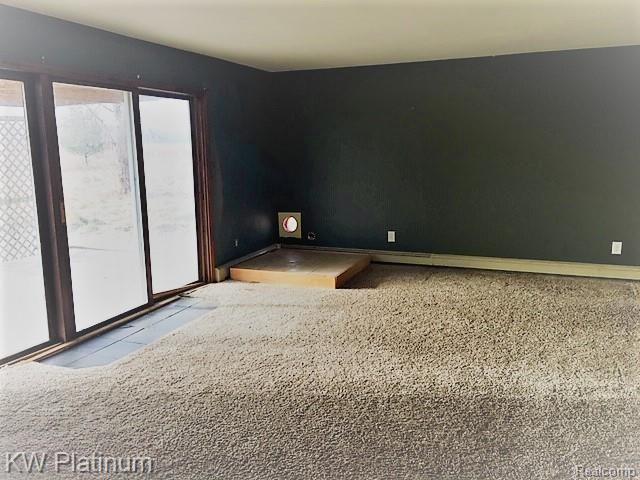 5209 McIntyre Road North Street, MI 48049 - Photo 7 of 26 family room.jpg