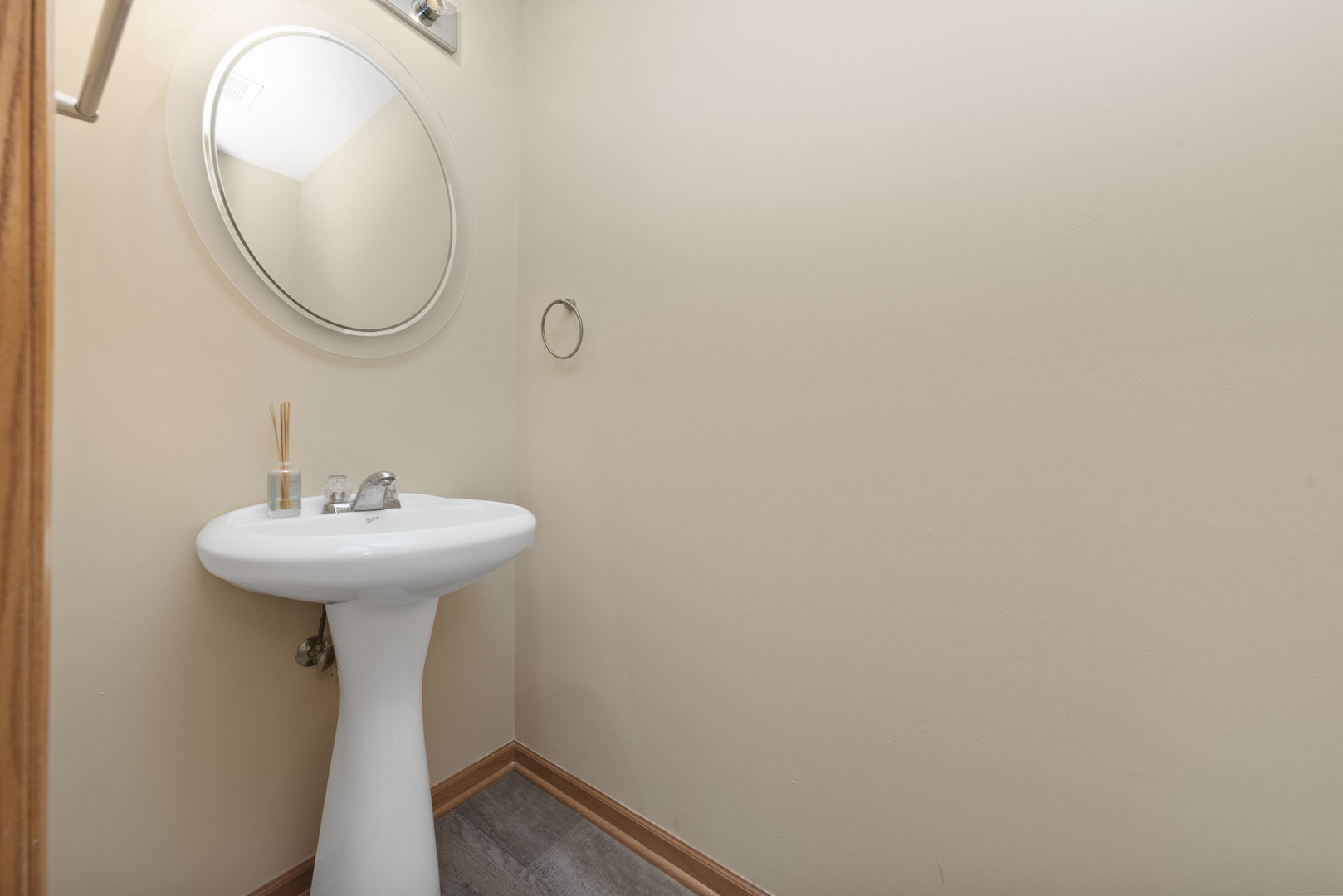231 Springbrook Trail South Oswego, IL 60543 - Photo 8 of 17 a bathroom with a sink and mirror
