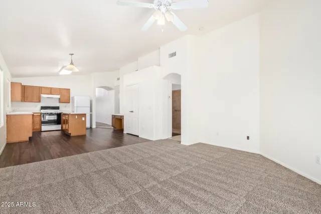 a view of a livingroom with furniture and wooden floor