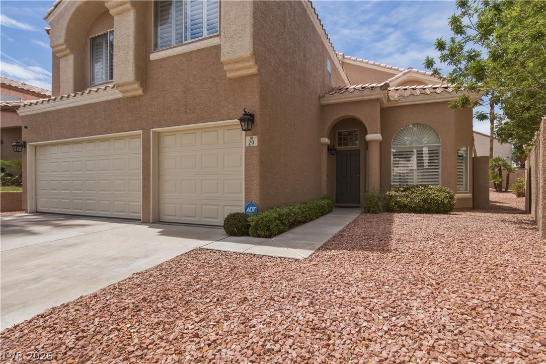 29 Olive Tree Henderson, NV 89074 - Photo 3 of 60 This charming home offers convenient garage access and a welcoming entry.