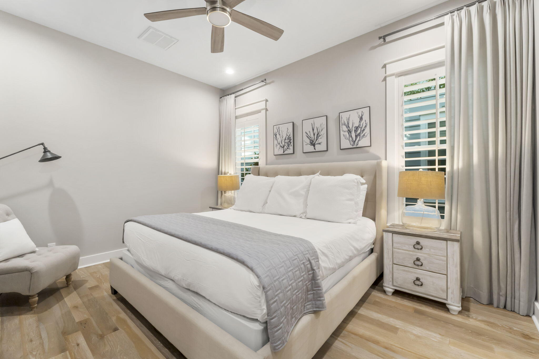 27 Anchor Rode Circle Santa Rosa Beach, FL 32459 - Photo 12 of 44 a spacious bedroom with a bed and a chandelier