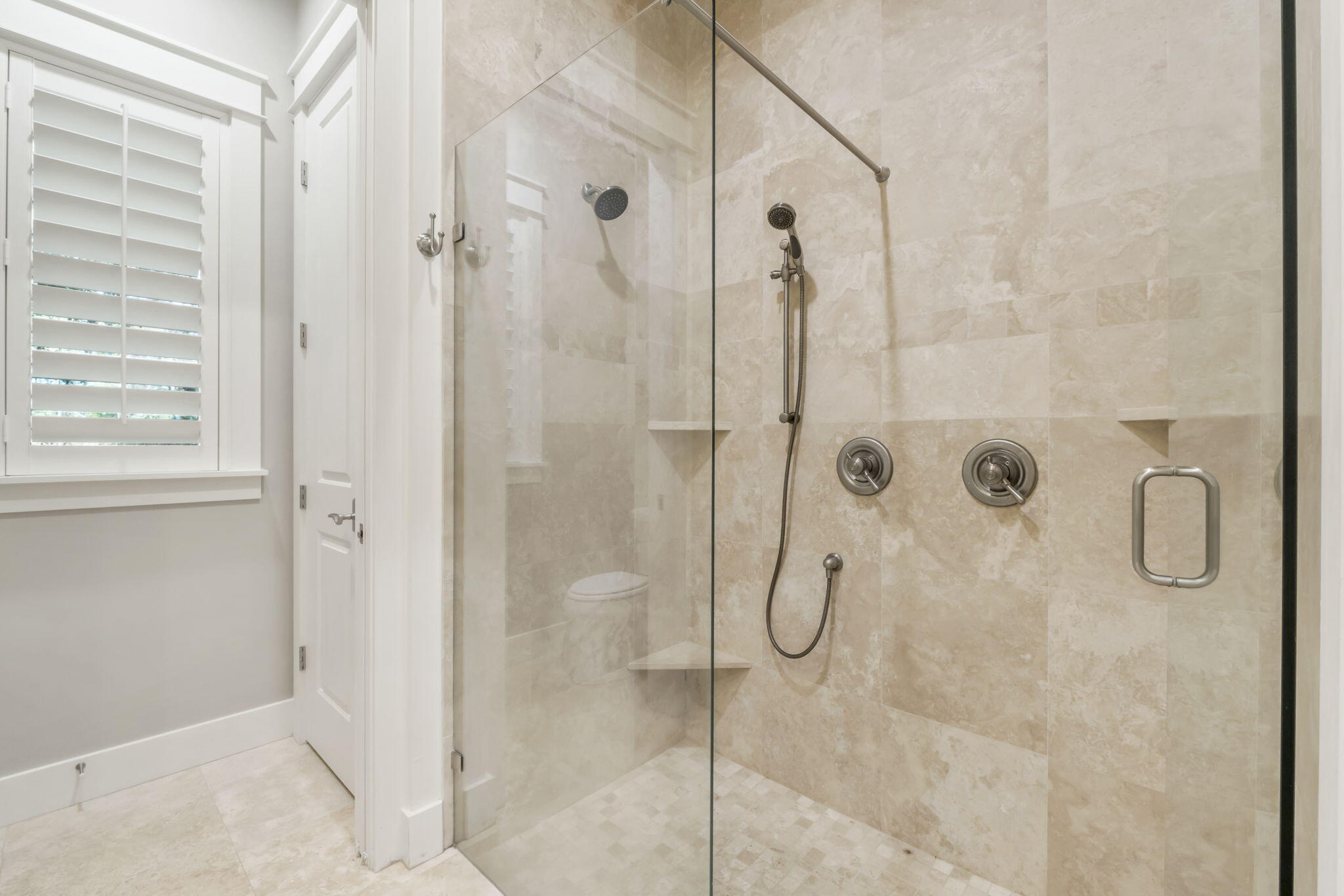 27 Anchor Rode Circle Santa Rosa Beach, FL 32459 - Photo 15 of 44 a bathroom with a glass shower door