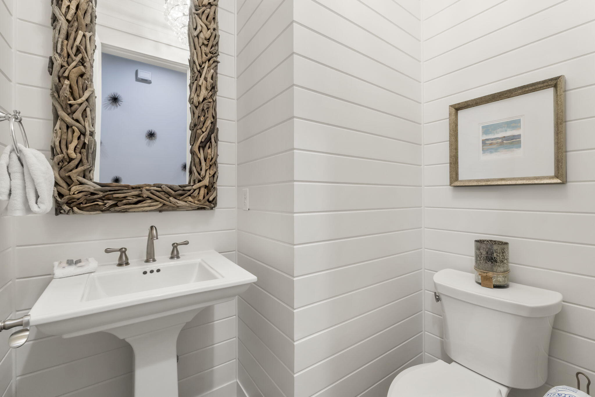 27 Anchor Rode Circle Santa Rosa Beach, FL 32459 - Photo 16 of 44 a bathroom with a sink a toilet and mirror