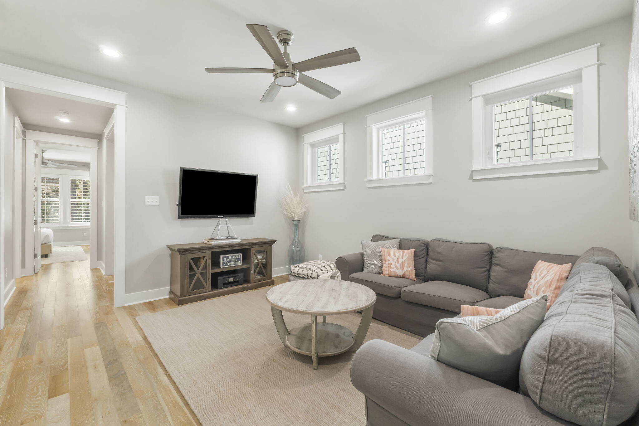 27 Anchor Rode Circle Santa Rosa Beach, FL 32459 - Photo 23 of 44 a living room with furniture and a flat screen tv