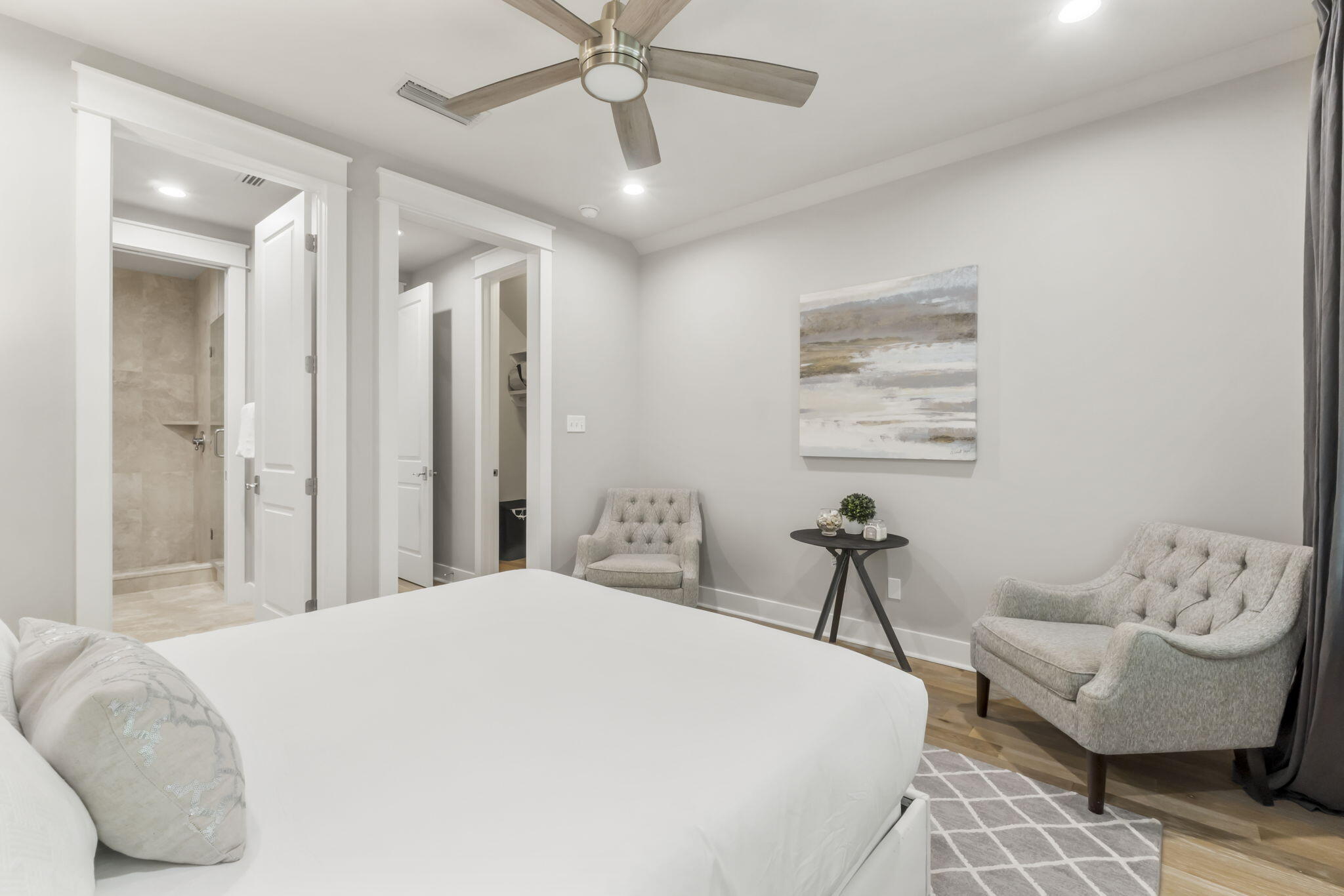 27 Anchor Rode Circle Santa Rosa Beach, FL 32459 - Photo 25 of 44 a bedroom with a bed and a chandelier